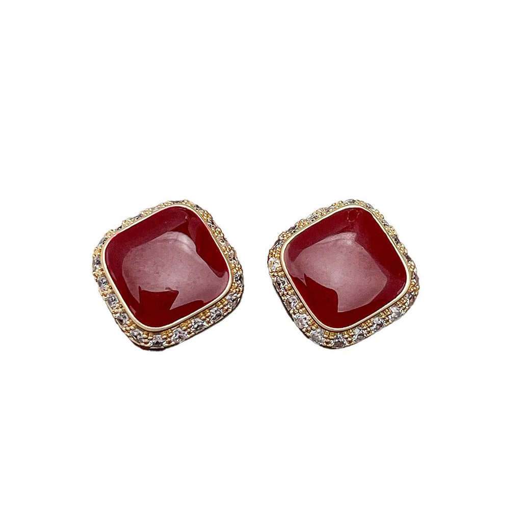 Red geometric square earrings with alloy construction and inlaid design detail