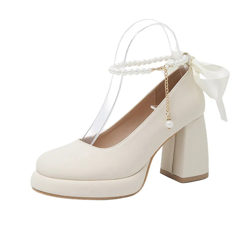Women's beige Mary Jane shoes with chunky heel, pearl decoration, and ankle-strap buckle