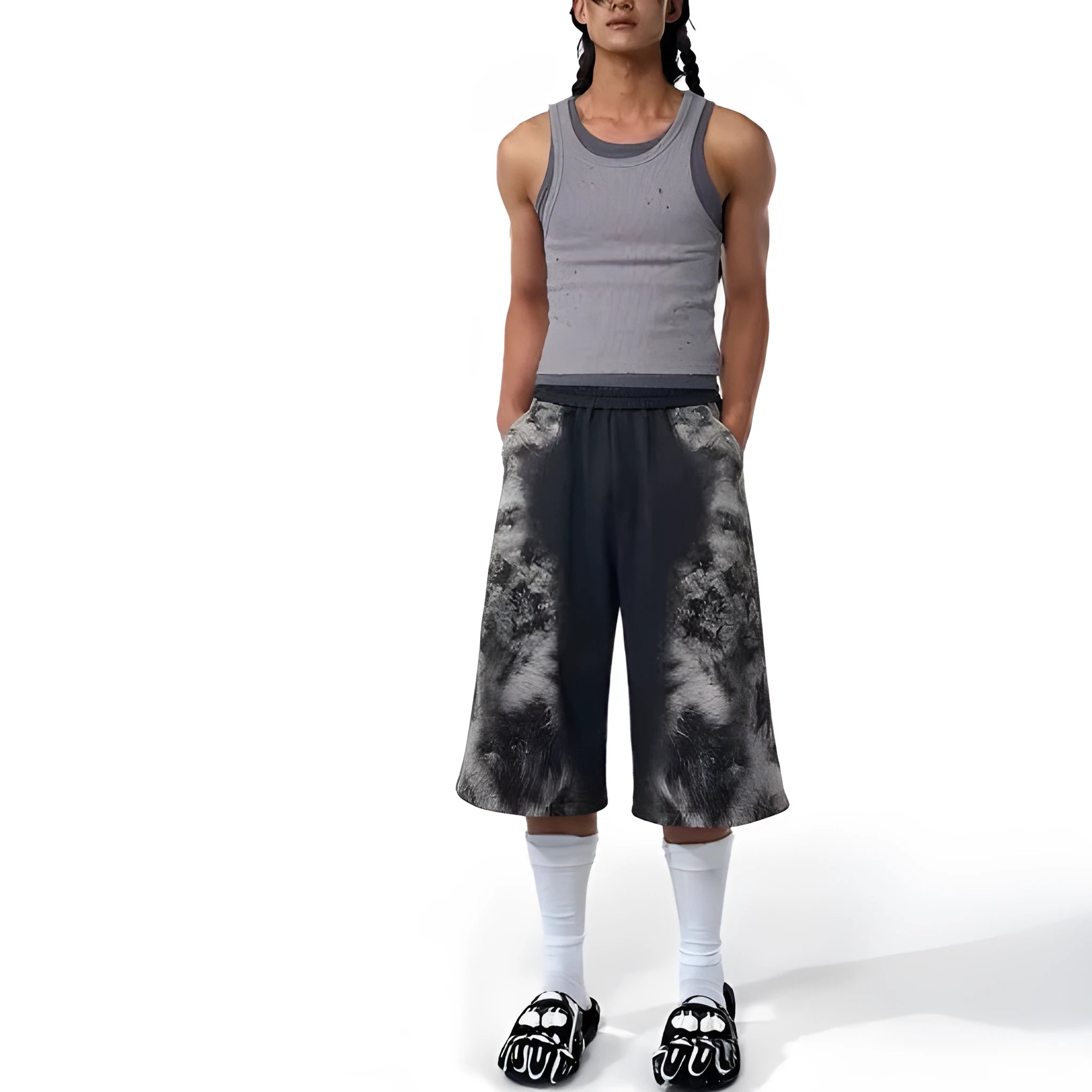 Women's loose printed polyester streetwear set showing hoodie, trousers, and seven-inch shorts.