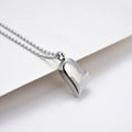 Silver tone curved peach heart stainless steel pendant necklace with adjustable chain