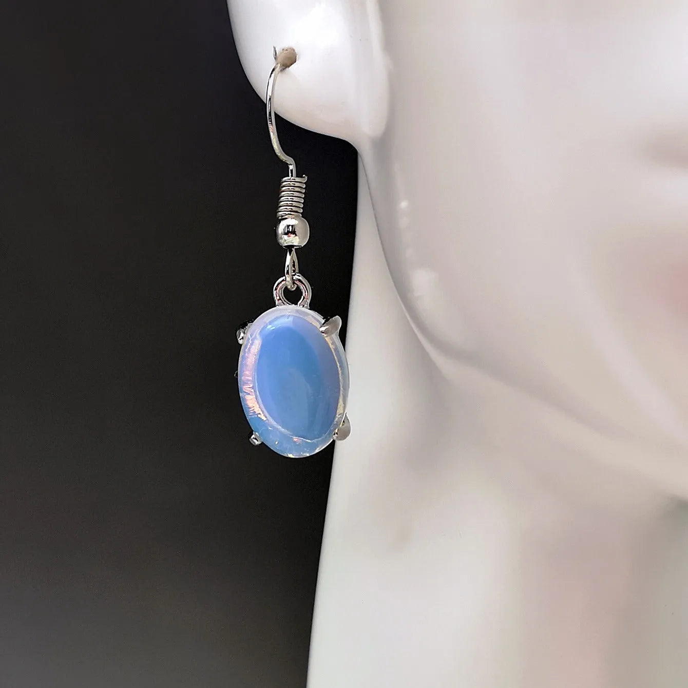 Moonlight white opal-inspired cross earrings with drop shape and electroplated alloy construction