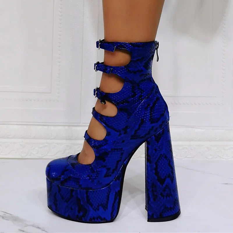 Women's black patent leather platform high heels with a thick serpentine belt and buckle closure.