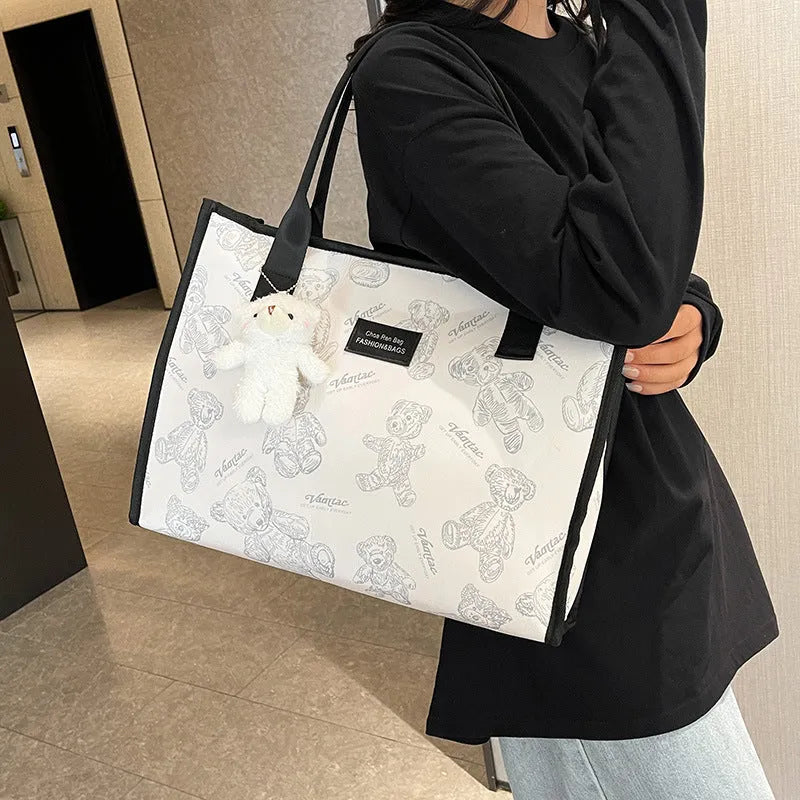 Women's printed diamond pattern canvas tote bag with cloth lining and sandwich pockets