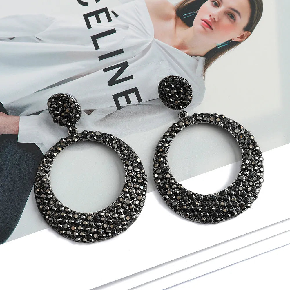 Women's colourful cartoon-style metal pendant earrings with large round design and diamond elements