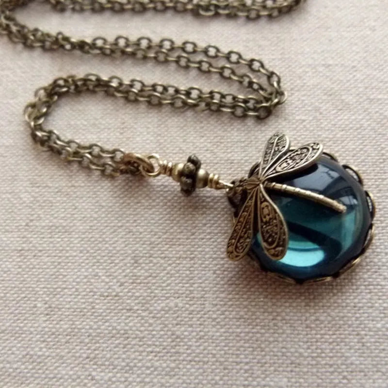 Yellow vintage bronze dragonfly pendant necklace on adjustable silver chain