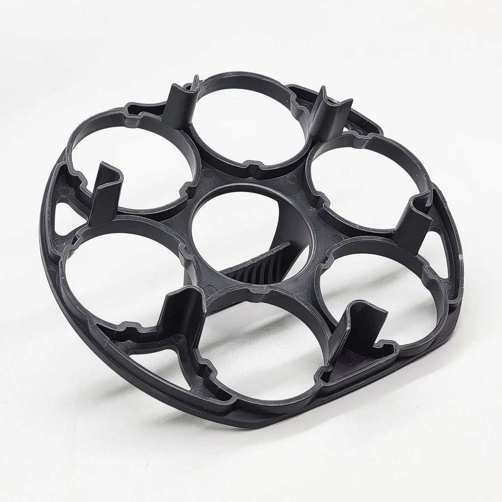 Black plastic egg holder basket measuring 13.8 by 12.6 by 5.7 centimetres
