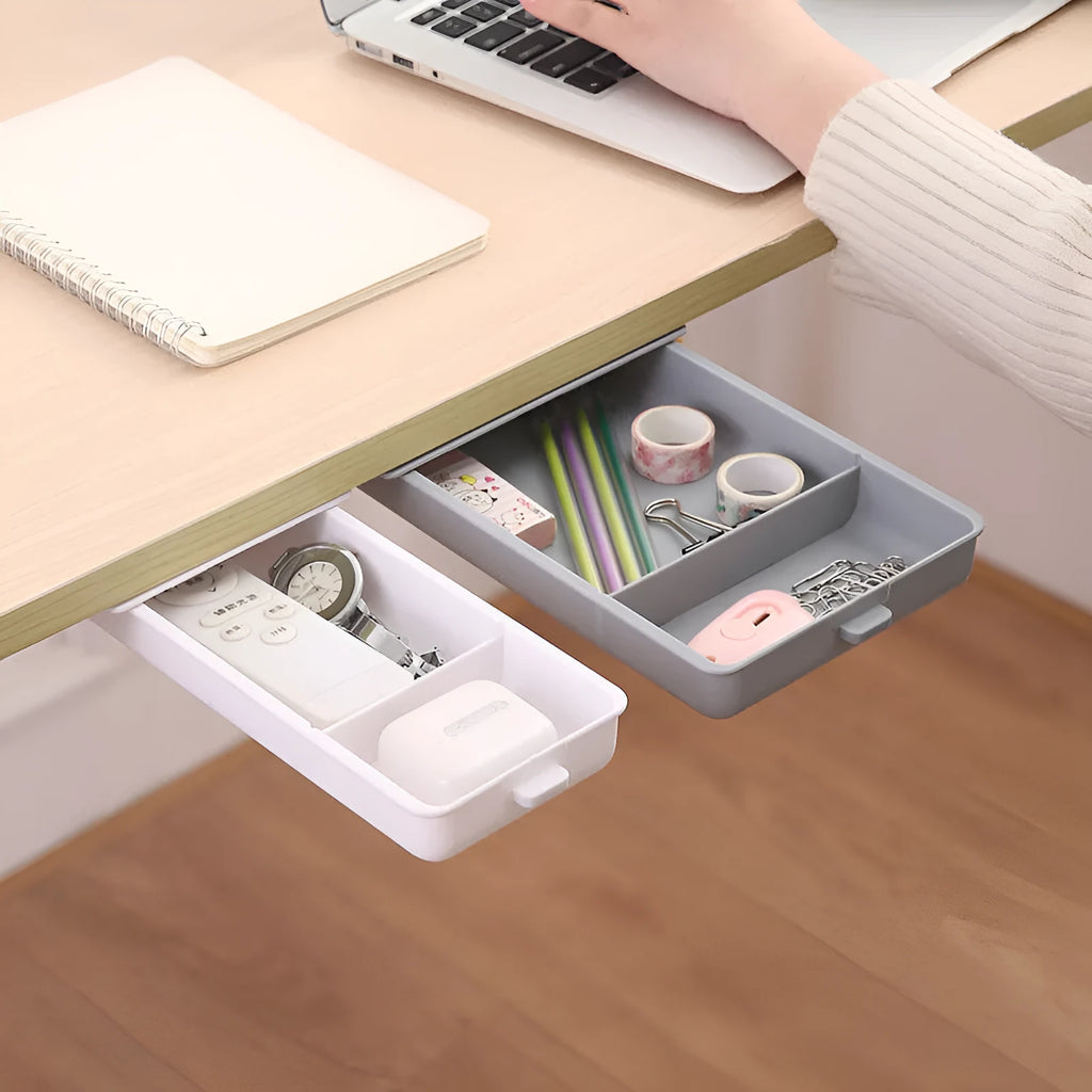 Plastic under-desk storage drawer with cover showing internal grid compartments