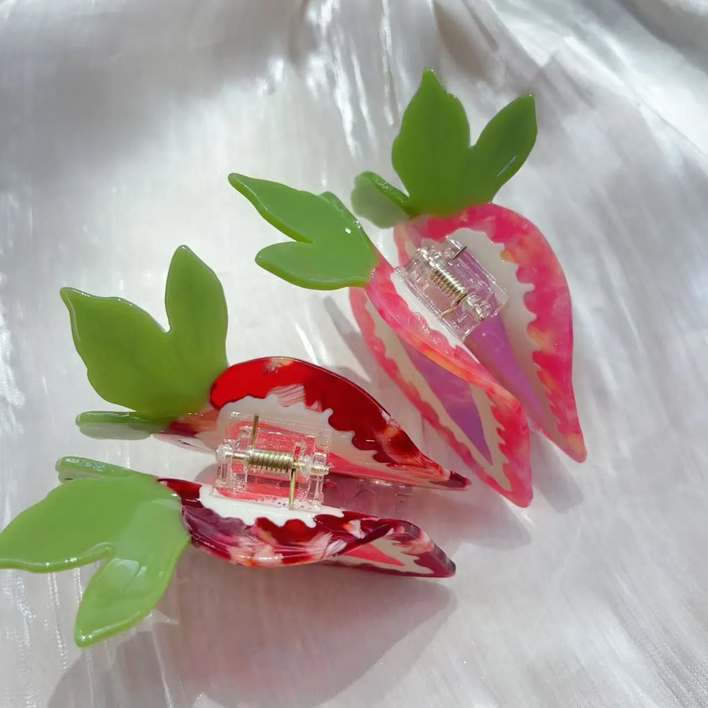 Red strawberry hairpin with manual craftsmanship on a white background