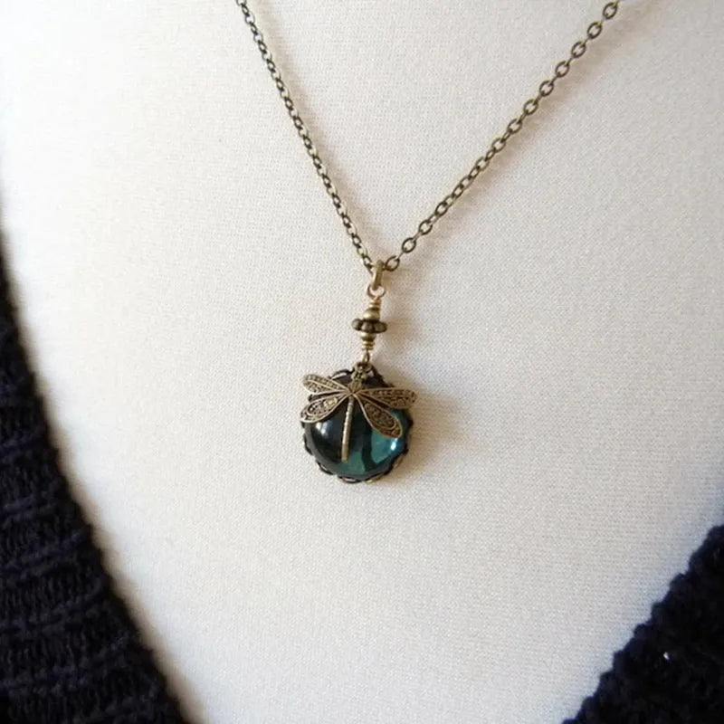 Yellow vintage bronze dragonfly pendant necklace on adjustable silver chain