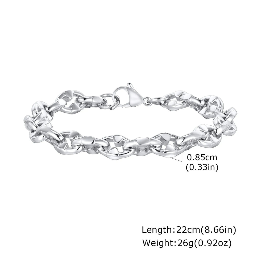Handmade thick stainless steel geometric chain bracelet for men on a grey background.