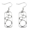 Geometric round ring earrings with irregular square design in antique silver finish
