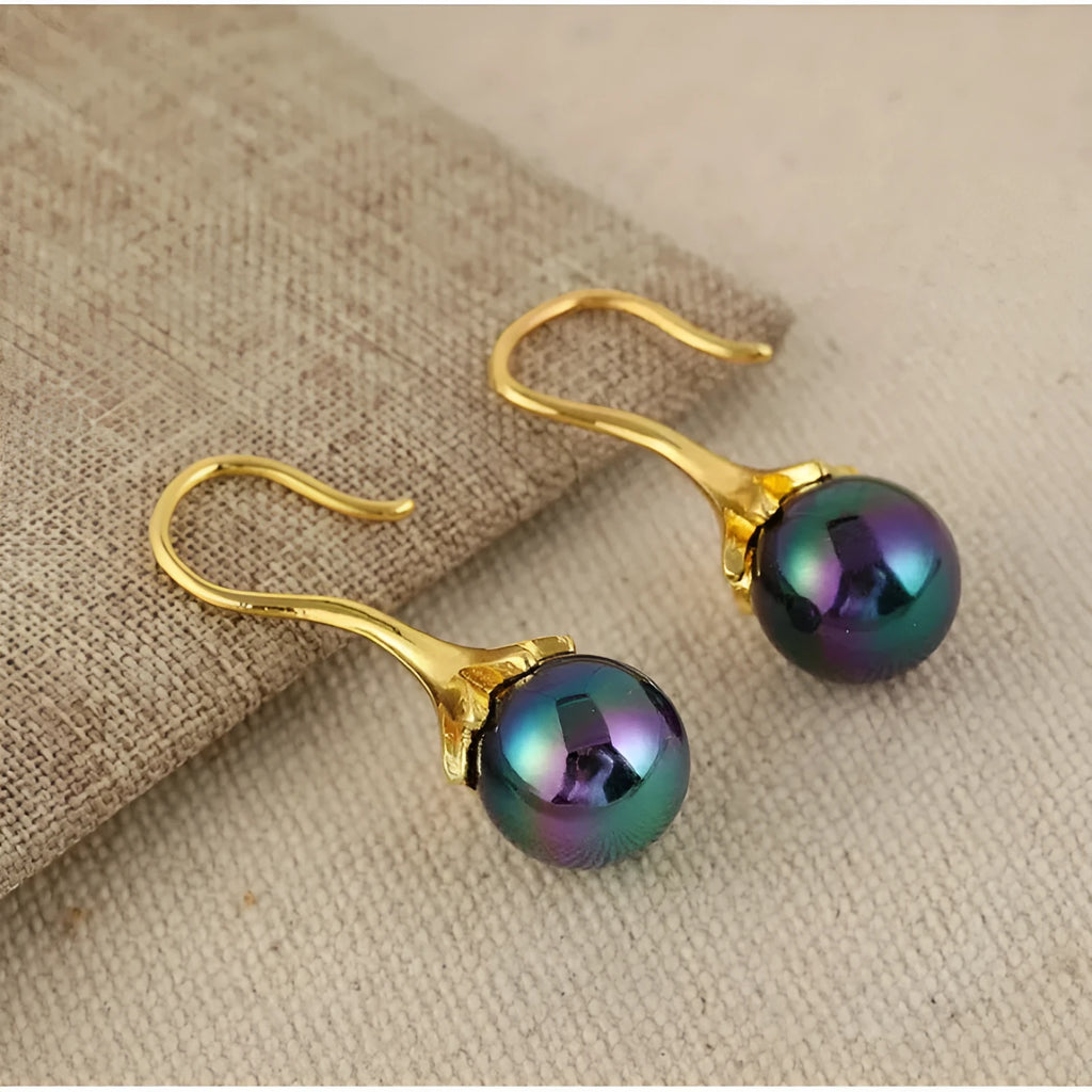 A pair of retro-style women's earrings with an imitation gold electroplated finish on an alloy base.