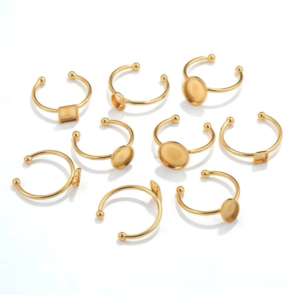 Golden electroplated stainless steel ring setting with totem pattern in various oval, rectangle, round and heart shapes