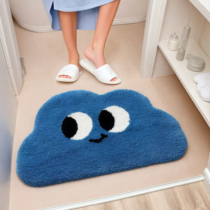 Colourful cartoon anime print bathroom mat with a soft cashmere-like texture on a bathroom floor.