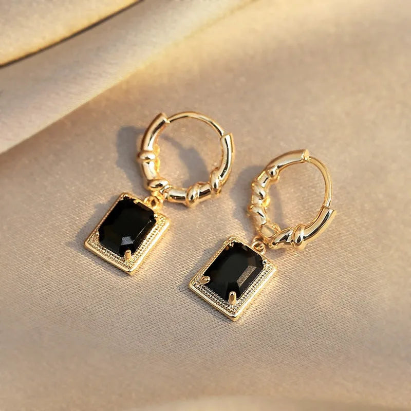 Geometric quadrilateral copper earrings with black zircon crystals in French court retro style
