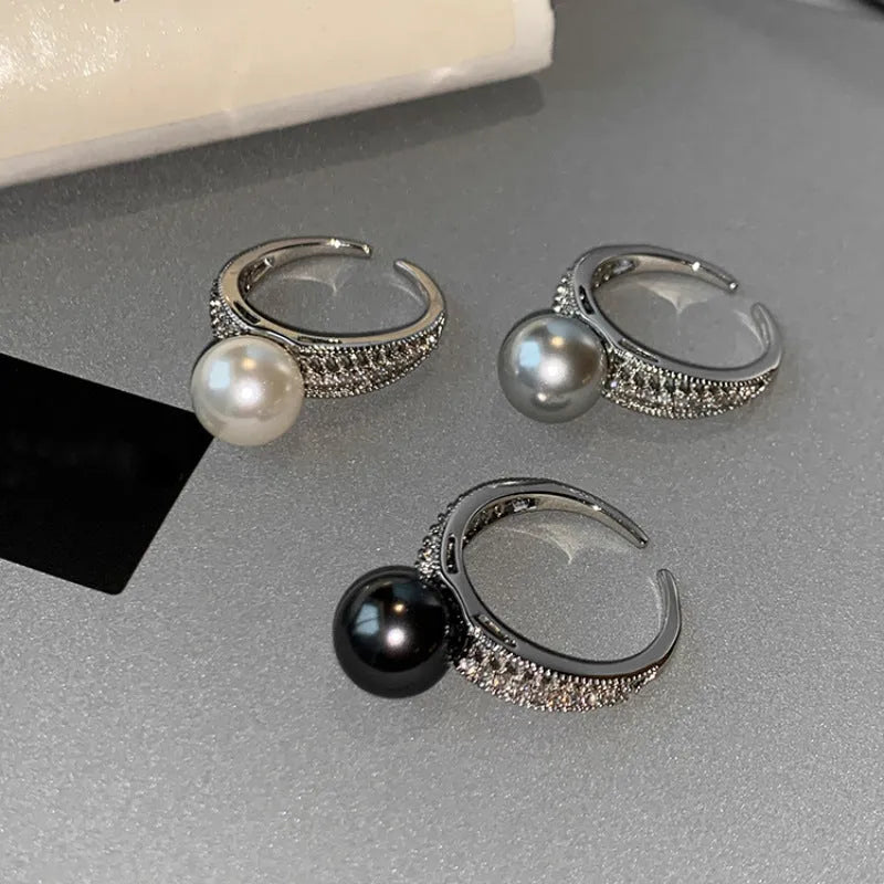 Adjustable opening copper ring with geometric shape and black pearl accents for women