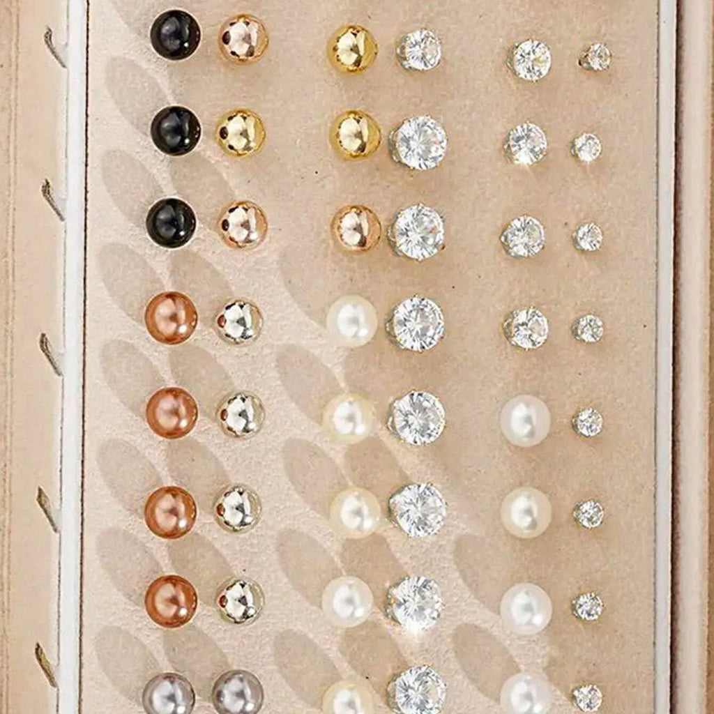 108 geometric alloy earrings in gold and yellow colours with round pearl-like elements
