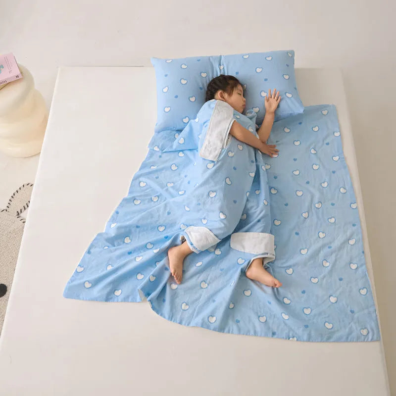 Anti-kick summer blanket in a choice of colours and sizes on a bed.
