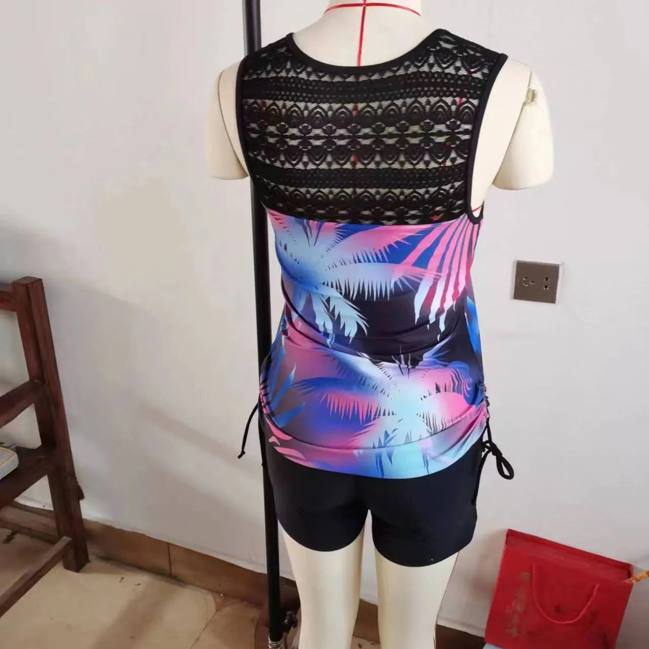 Blue floral printed lace two-piece women's swimsuit with removable padded top.
