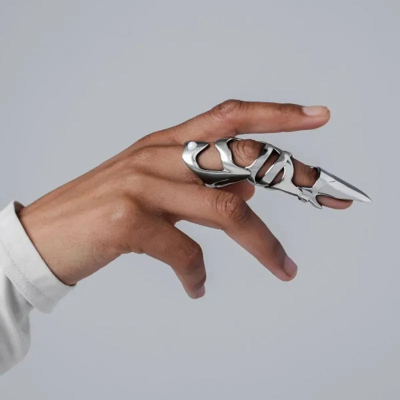 Polished silver alloy punk armour finger stall ring showing detailed sculpted metal design