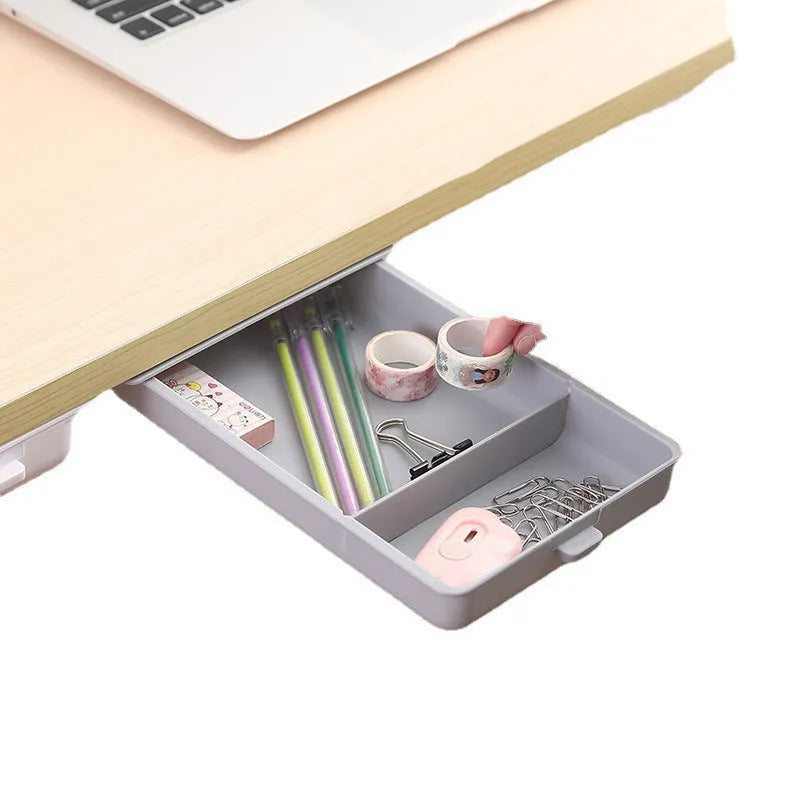 Plastic under-desk storage drawer with cover showing internal grid compartments