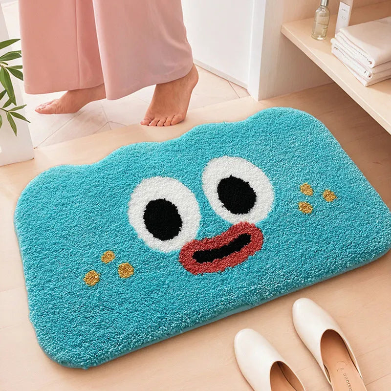 Colourful cartoon anime print bathroom mat with a soft cashmere-like texture on a bathroom floor.
