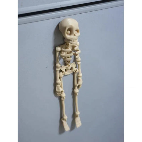 3D printed skull refrigerator magnet in modern art style measuring 18cm high