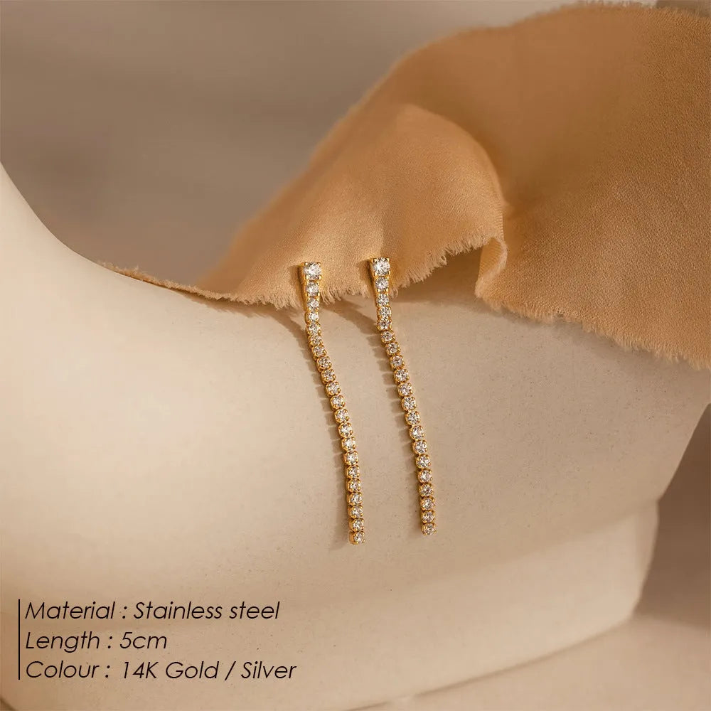 Sweet Elegance women's geometric zircon earrings in stainless steel, shown in gold and steel colour options.