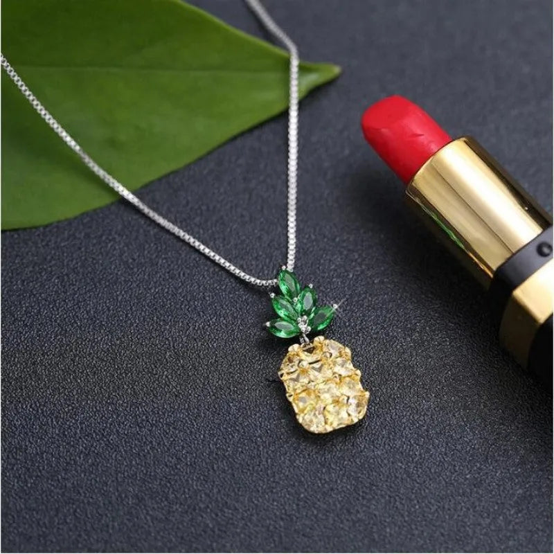 Korean fashion women's necklace with geometric pineapple fruit design and diamond elements in silver white gold colour