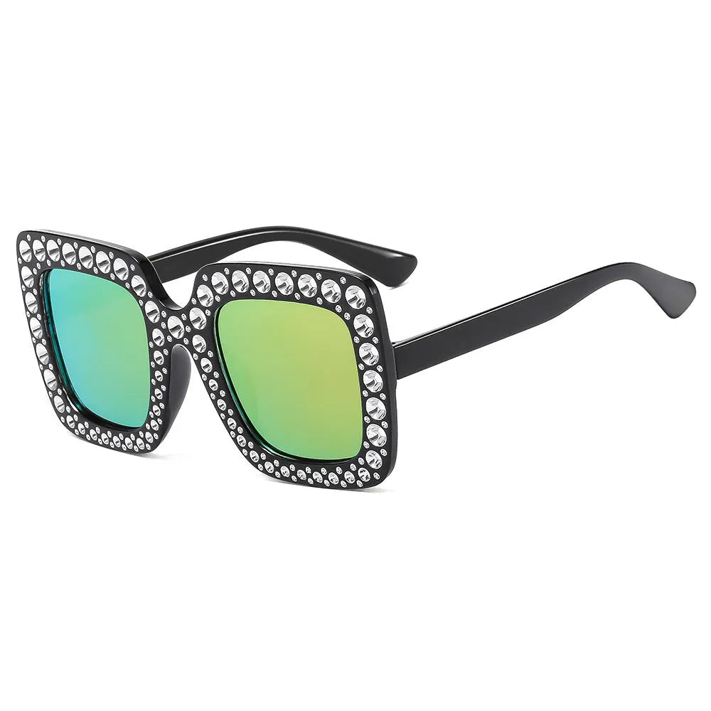 Plastic fashion sunglasses in various colour combinations including black frame gray lens and transparent tea frame brown lens options