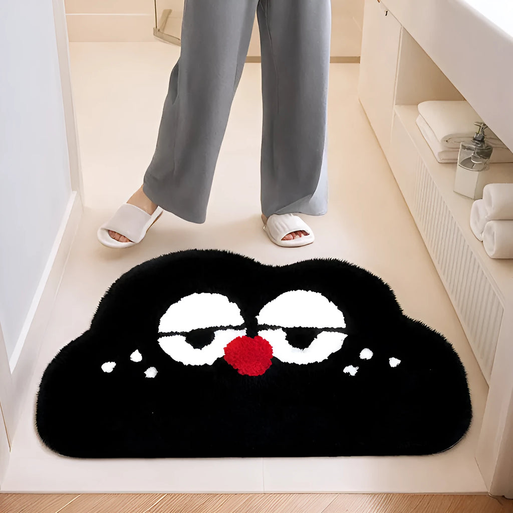 Colourful cartoon anime print bathroom mat with a soft cashmere-like texture on a bathroom floor.