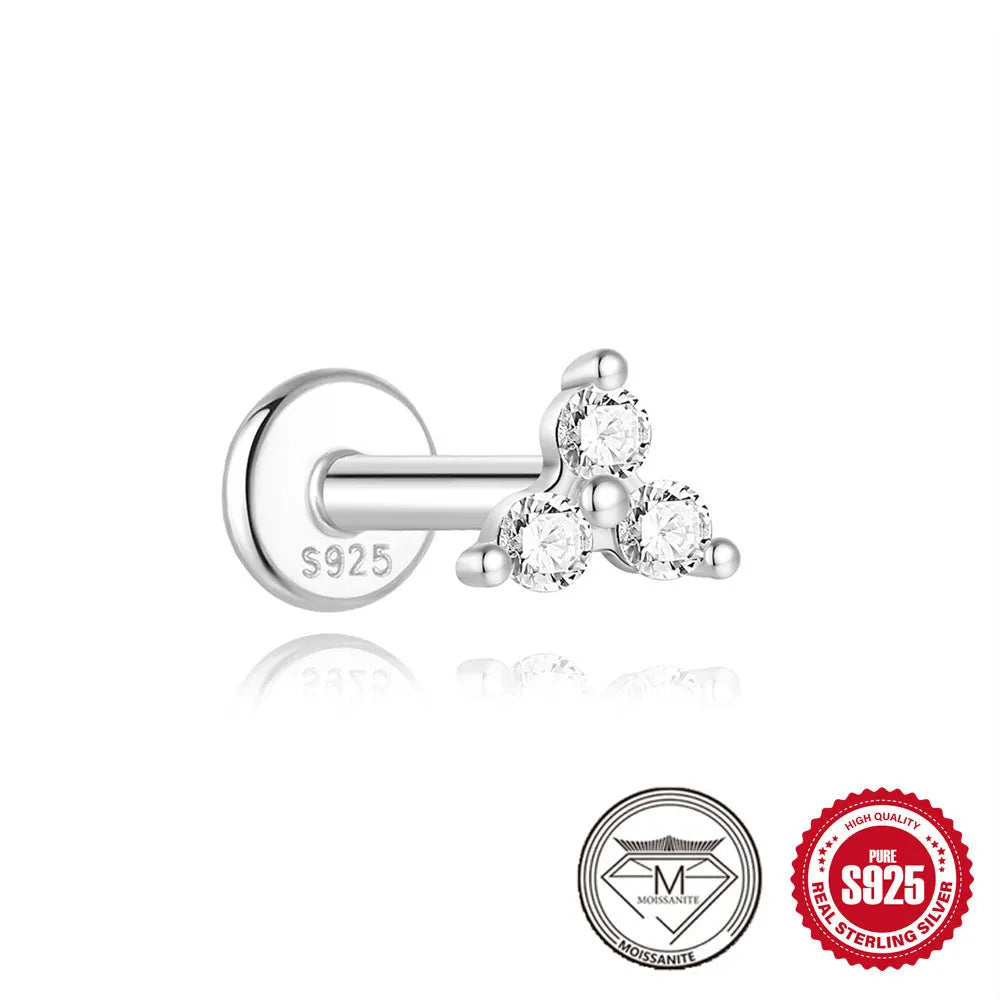 S925 sterling silver stud earrings showing petal, geometric, and round diamond designs on a grey background.