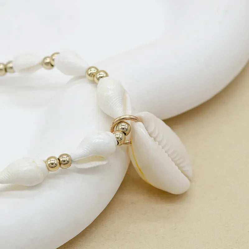 White conch bead necklace with genuine mother of pearl shell pendant on regular chain