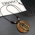 Adjustable wooden leaf ethnic necklace with cotton linen chain and electroplated pendant