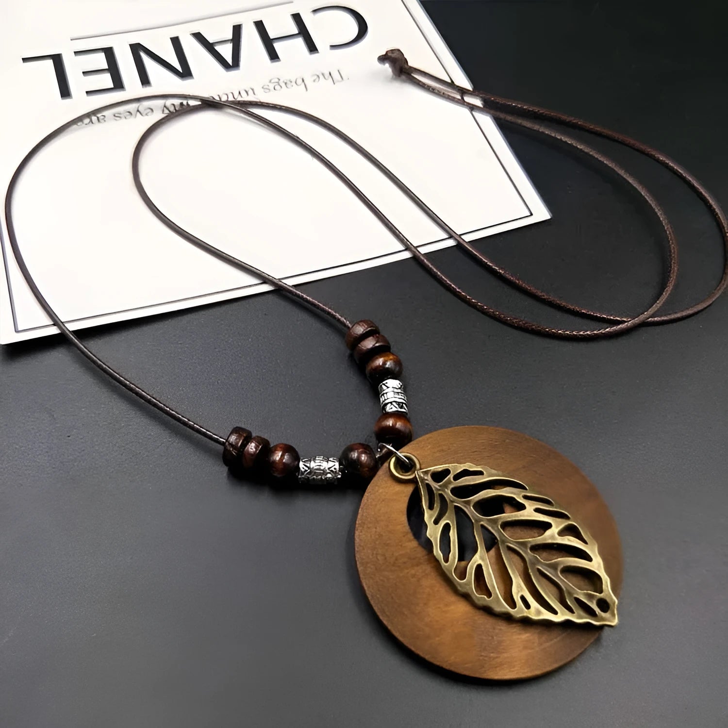 Adjustable wooden leaf ethnic necklace with cotton linen chain and electroplated pendant