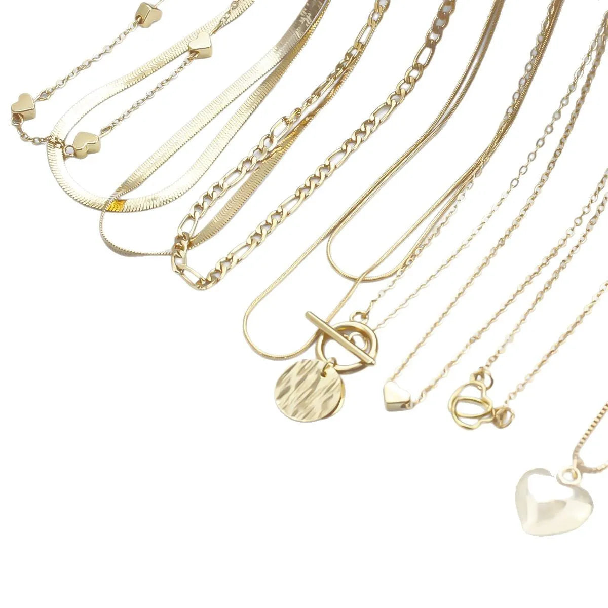 Set of 10 gold electroplated women's necklaces with snake bones chains and alloy pendants
