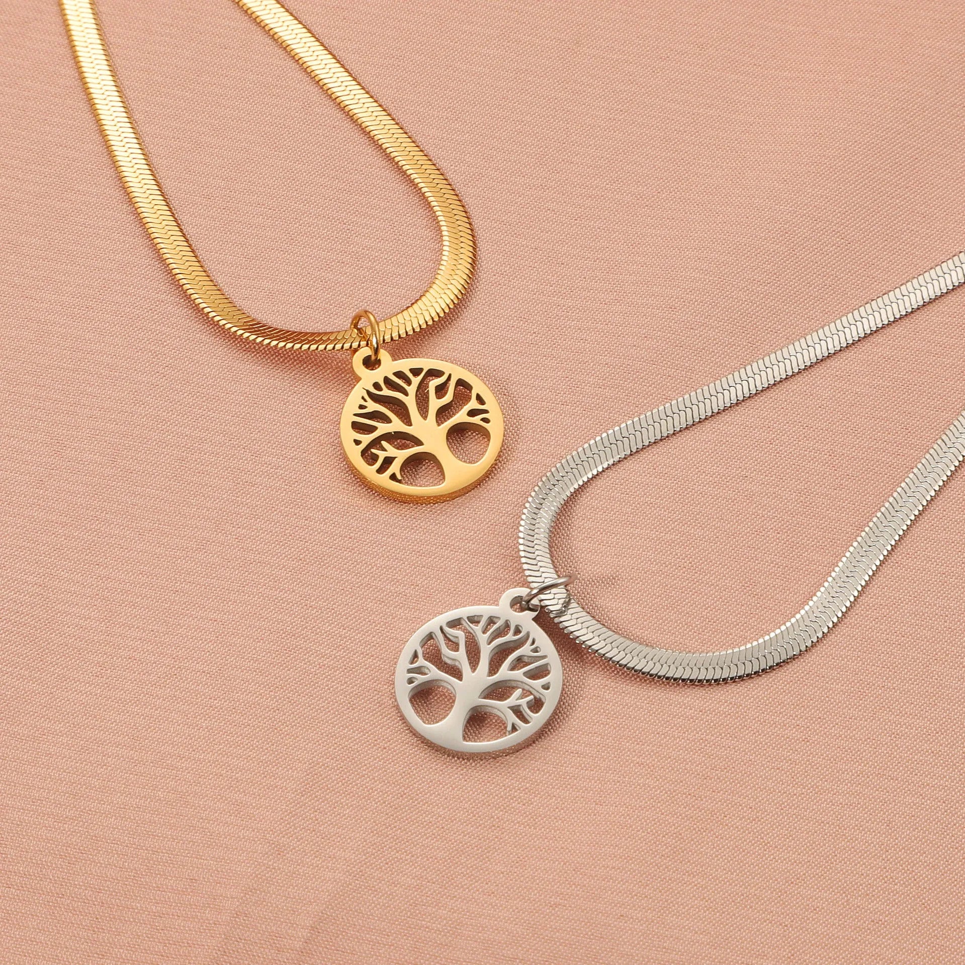 Stainless steel necklace with tree pendant on snake bone chain in gold colour option