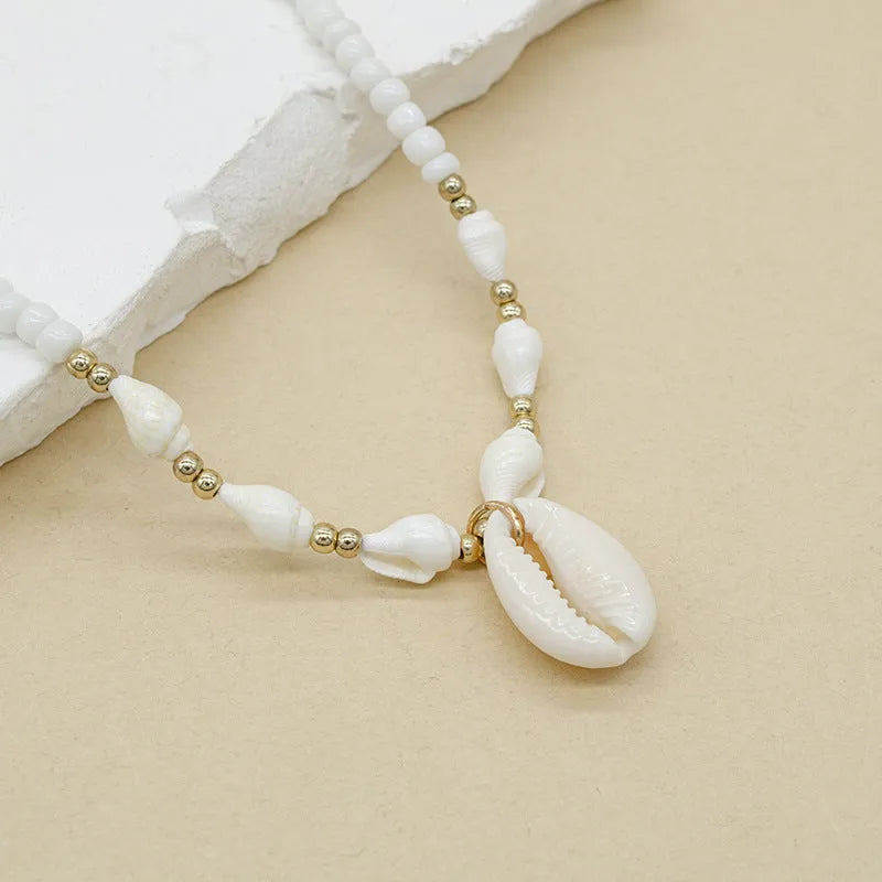 White conch bead necklace with genuine mother of pearl shell pendant on regular chain