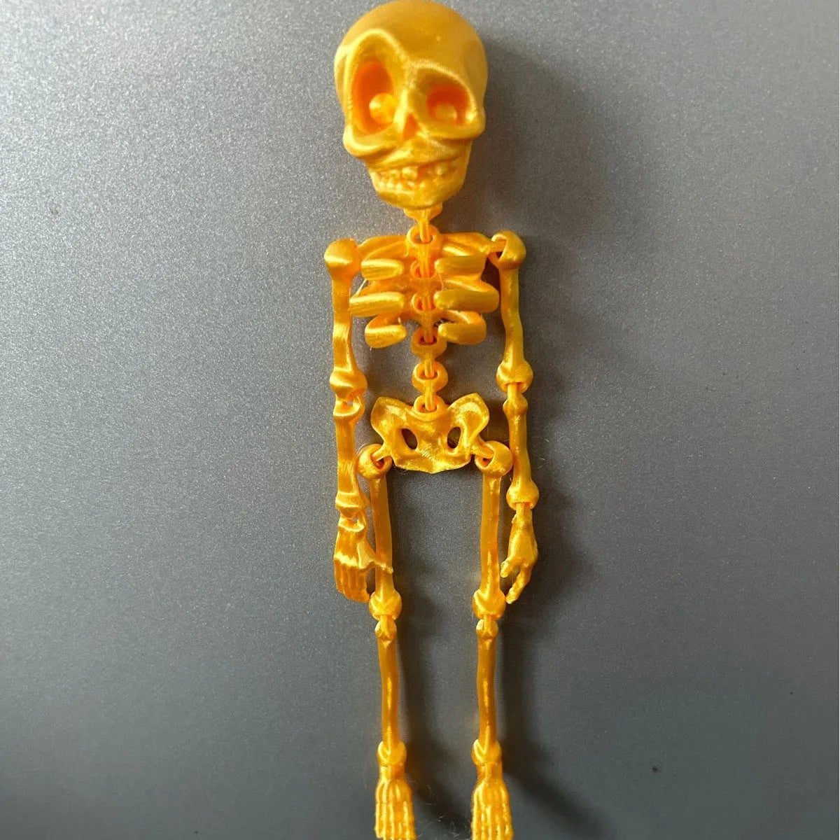 3D printed skull refrigerator magnet in modern art style measuring 18cm high