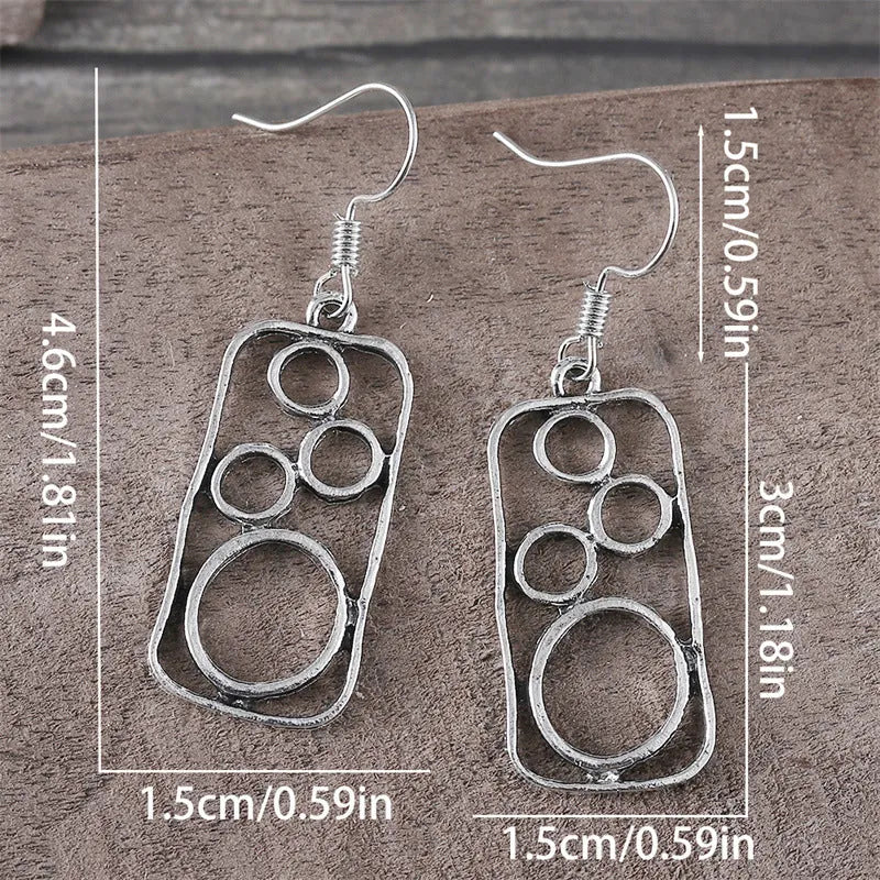 Geometric round ring earrings with irregular square design in antique silver finish