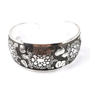 Carved open alloy bracelet with Miao ethnic design in elephant or turtle colour finish