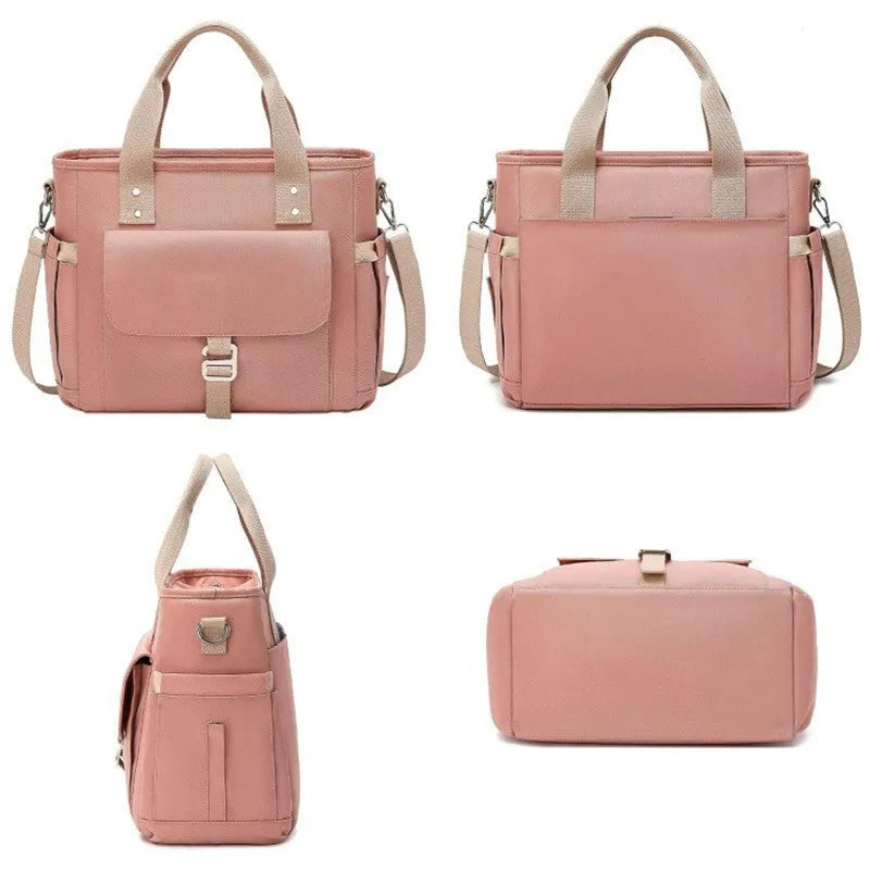 Portable cube-shaped thermal picnic bag with a removable shoulder strap and side pocket.