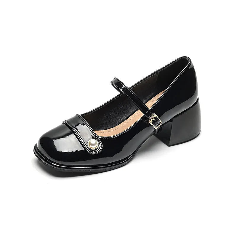 Women's patent leather chunky heel pumps with square toe and buckle fastening, shown in apricot colour.