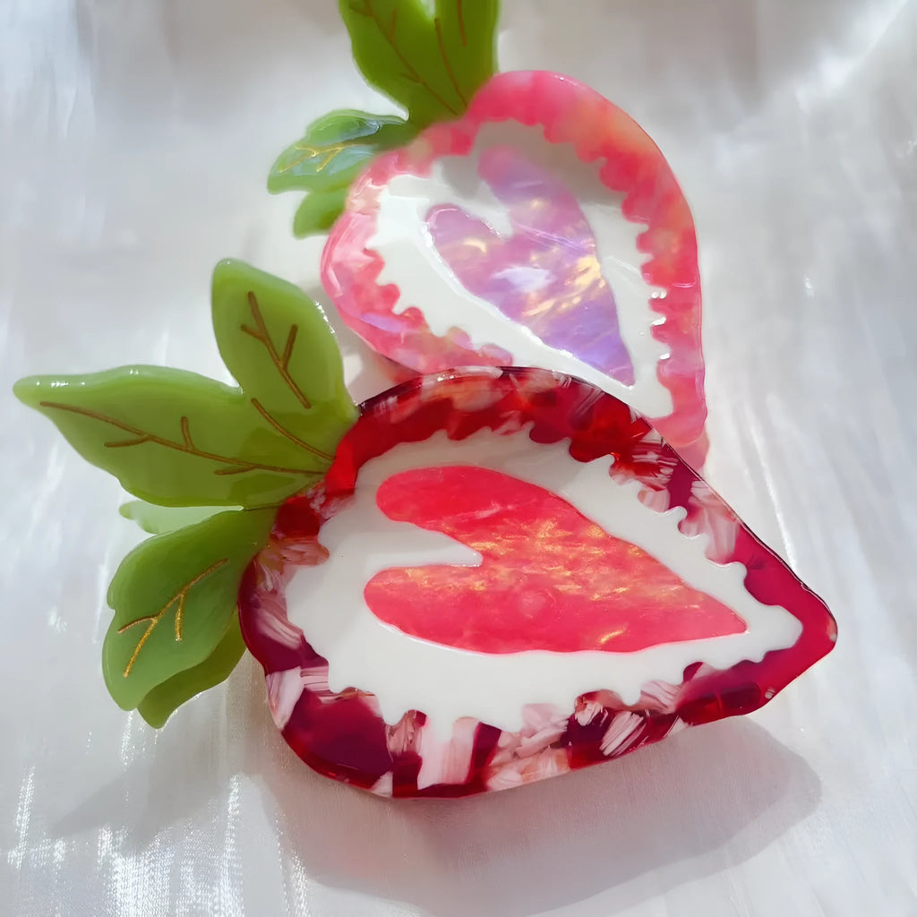 Red strawberry hairpin with manual craftsmanship on a white background