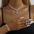 Claw chain rhinestone jewellery set with water drop pendant necklace and matching earrings