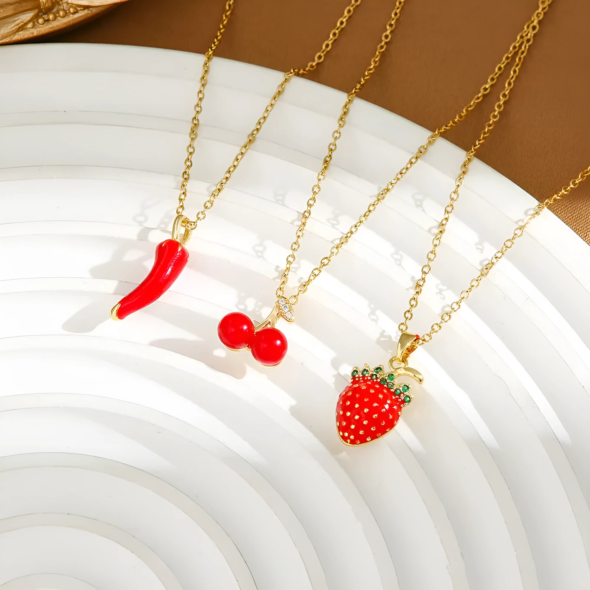 Titanium steel necklace with delicate cherry, strawberry, and pepper charms on O-ring chain