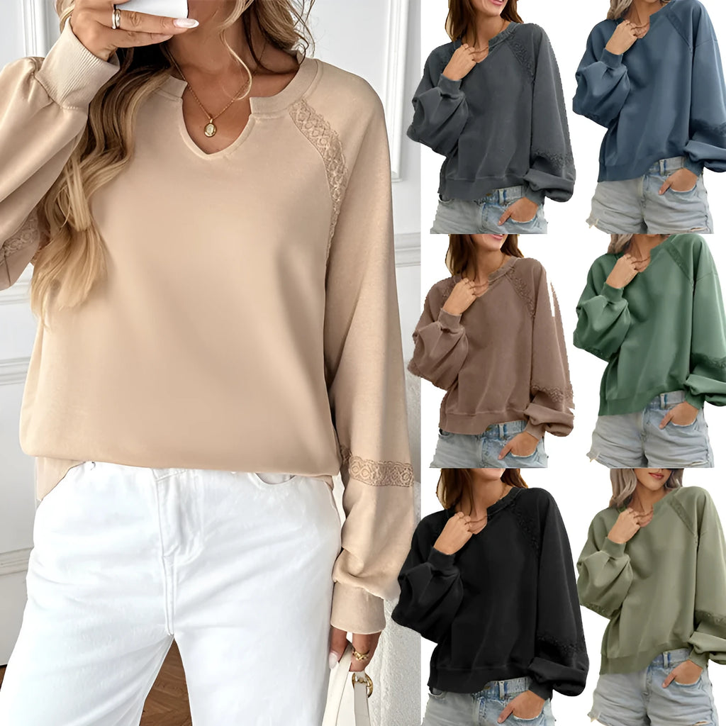 Women's loose long sleeve sweater in apricot with a half-open collar and lace stitching detail.