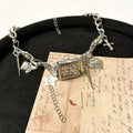 Dark multi-layer cross necklace with twin clavicle chain, adjustable 41-50cm length, alloy construction