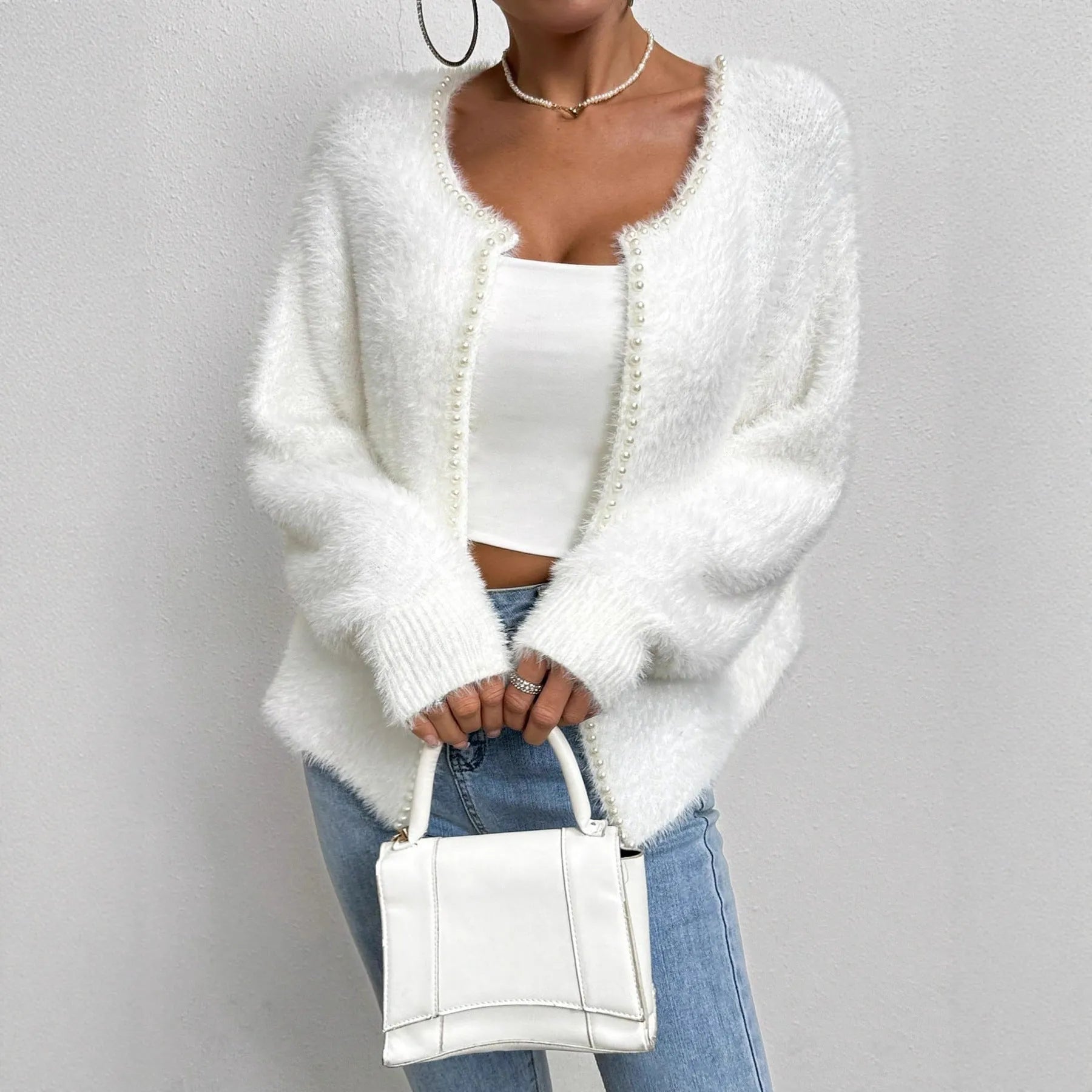 Women's white V-neck cardigan sweater with medium thickness and normal length