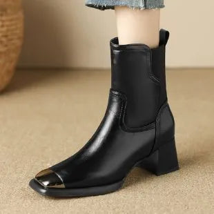 Women's brown and black slimming Martin ankle boots with side zipper and decorative metal details.